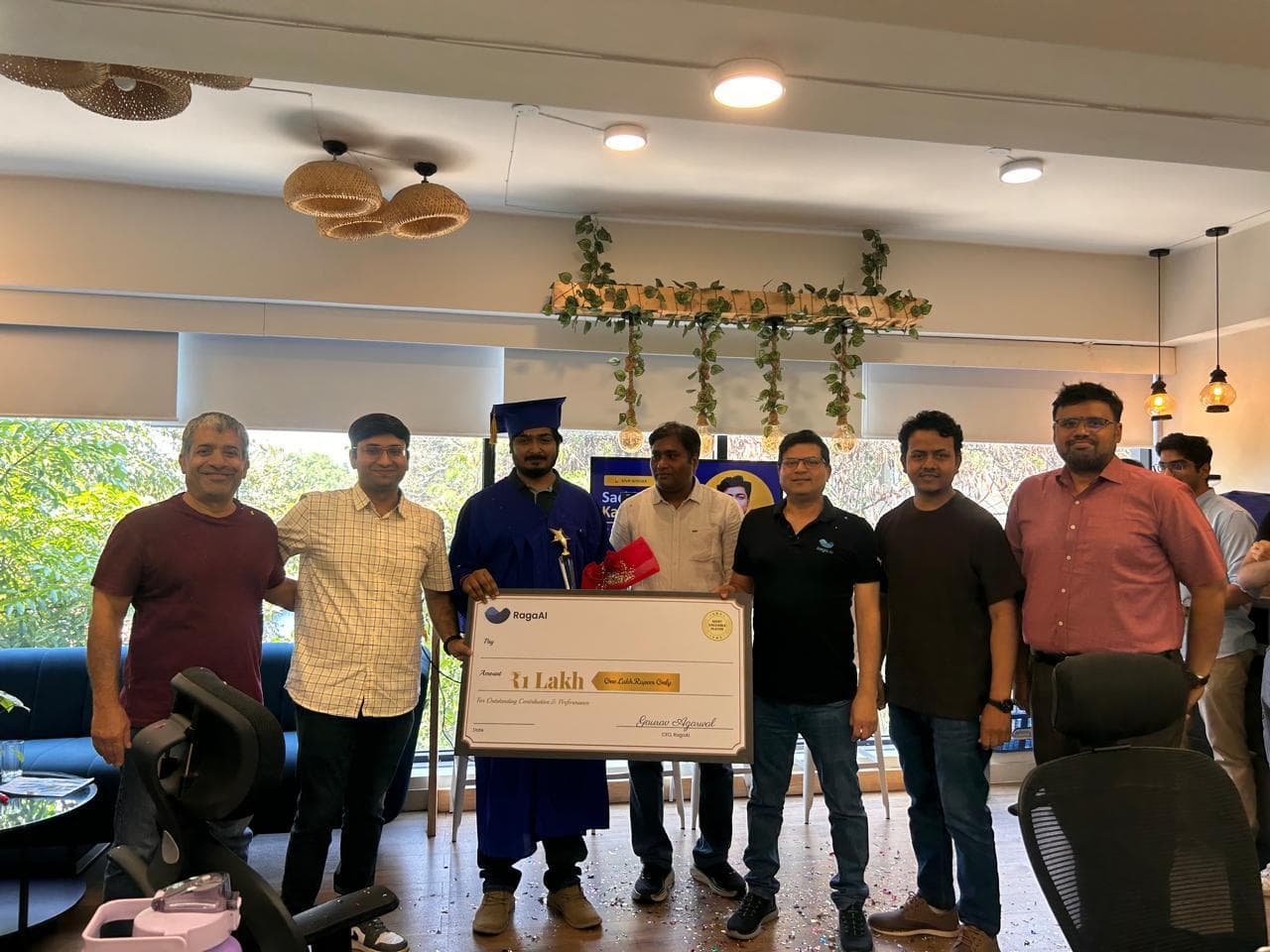 Sachin Kamat receiving the Q1 2026 MVP award at the RagaAI office